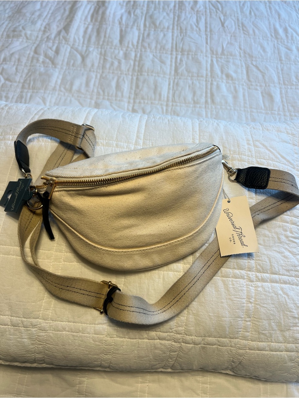 Universal Thread Cream Canvas Crossbody Bag with Gold Zipper and black accents